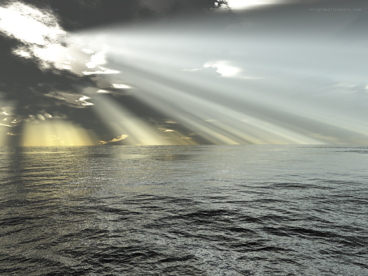 Sunlight beams over the ocean