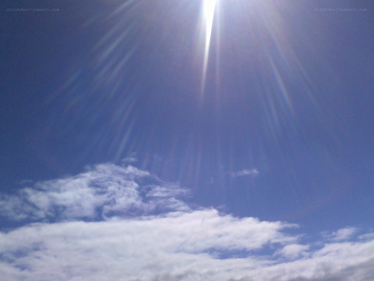 Sunlight beams through clouds