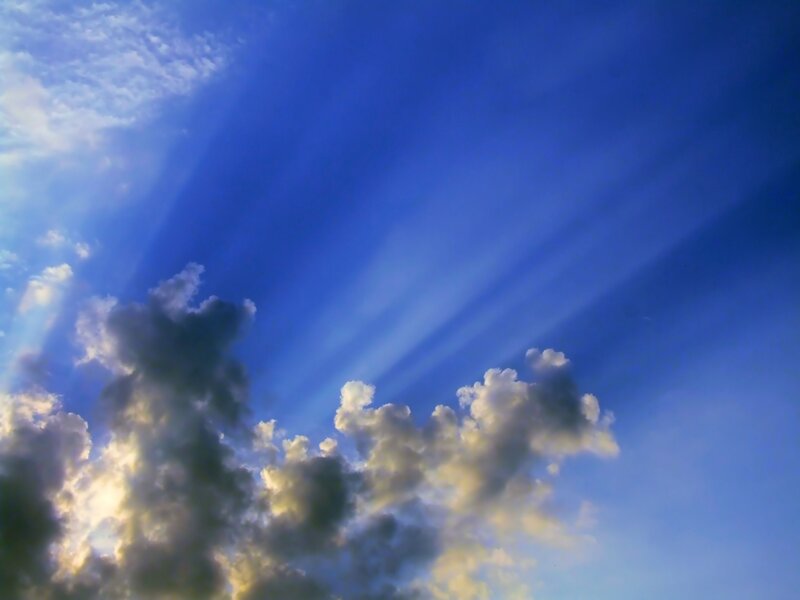 Sunlight beams through clouds