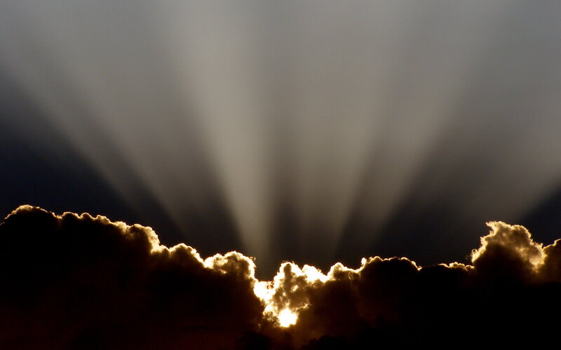 Sunlight beams through clouds