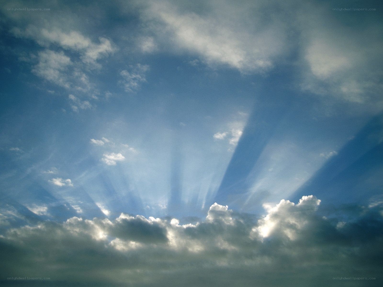 Sunlight beams through clouds