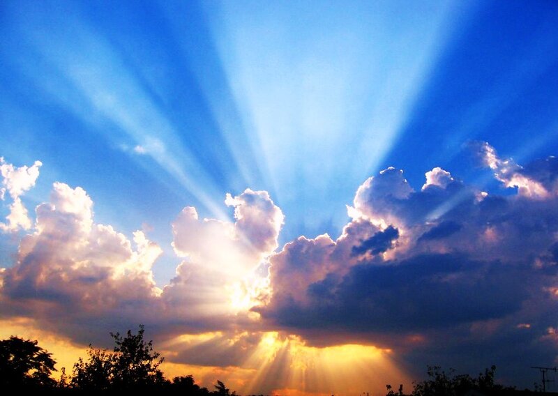 Sunlight beams through clouds