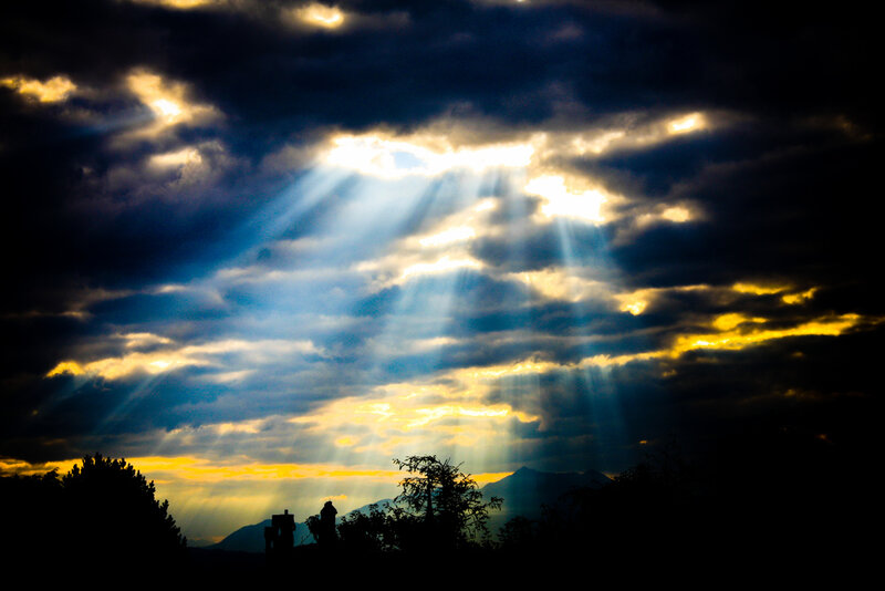 Sunlight beams through clouds
