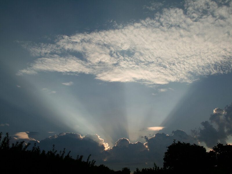 Sunlight beams through clouds