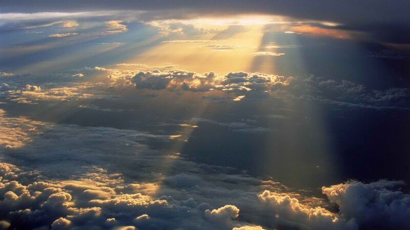 Sunlight beams through clouds