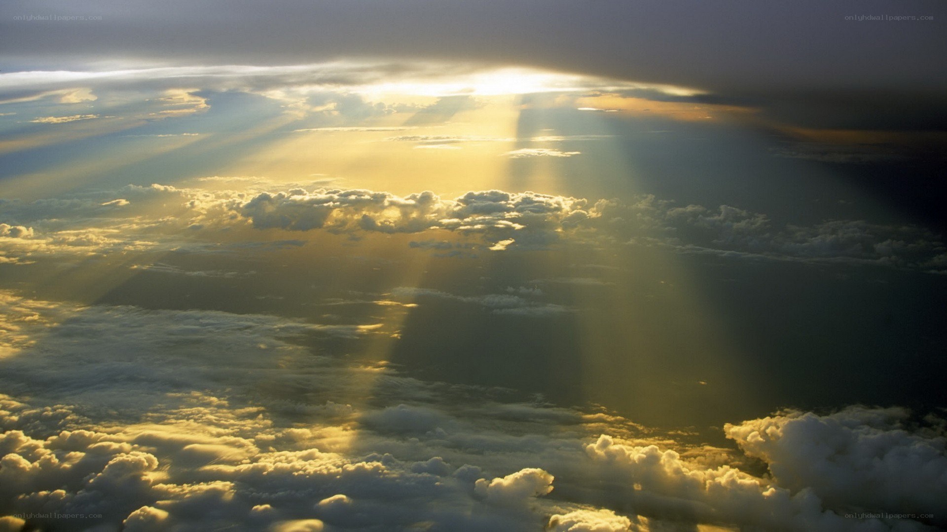 Sunlight beams through clouds