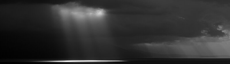 Sunlight Beams Through Clouds — Black, Dramatic