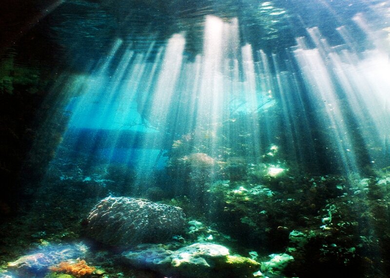 Sunlight Beams Underwater — Blue, Serene, Photograph, Rocks