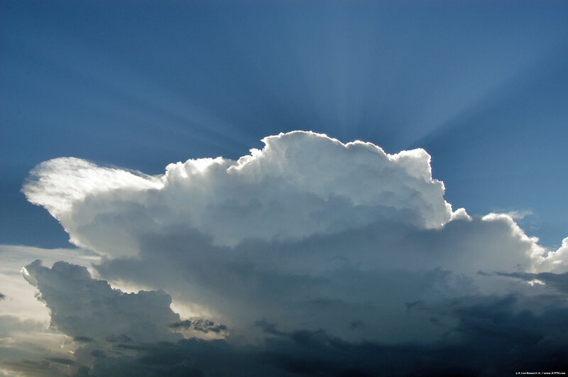 Sunlight breaking through a storm cloud