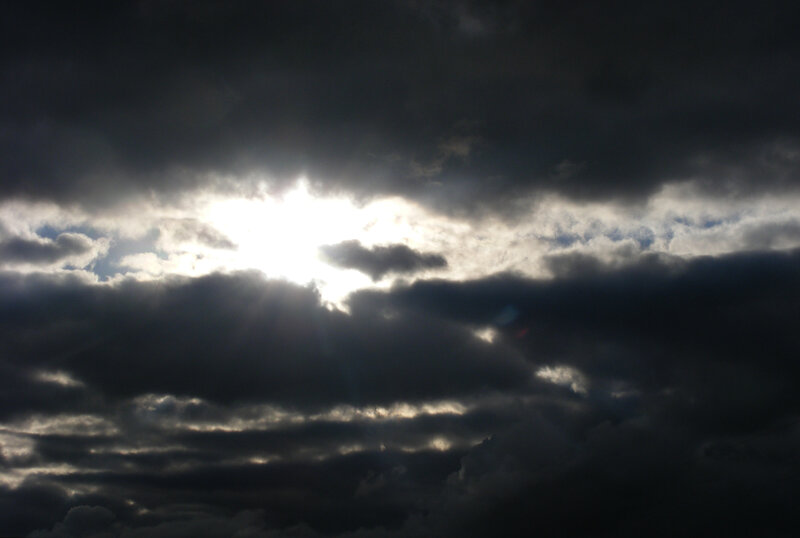 Sunlight breaking through storm clouds