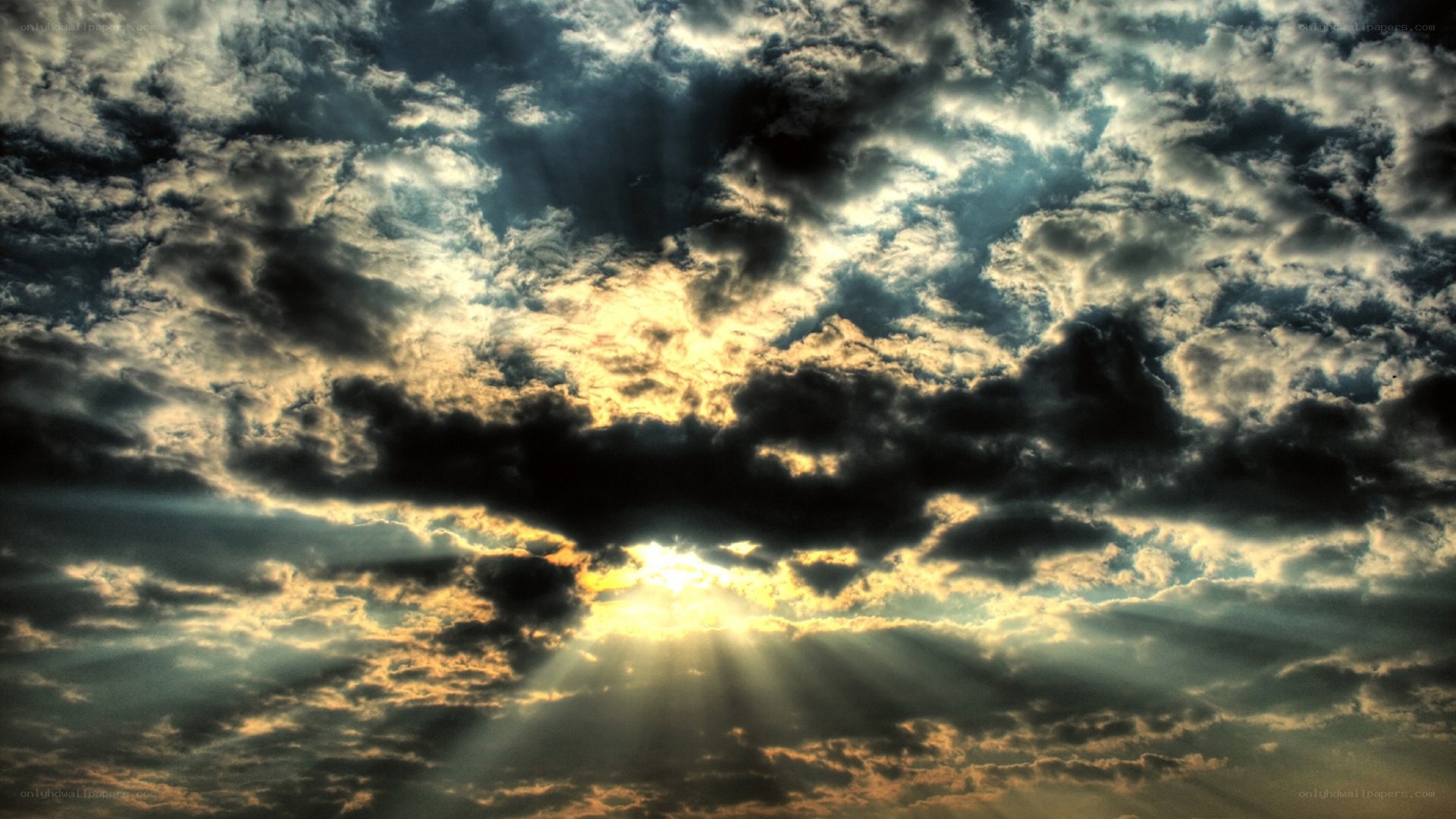 Sunlight breaking through storm clouds