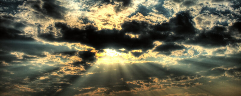 Sunlight breaking through storm clouds