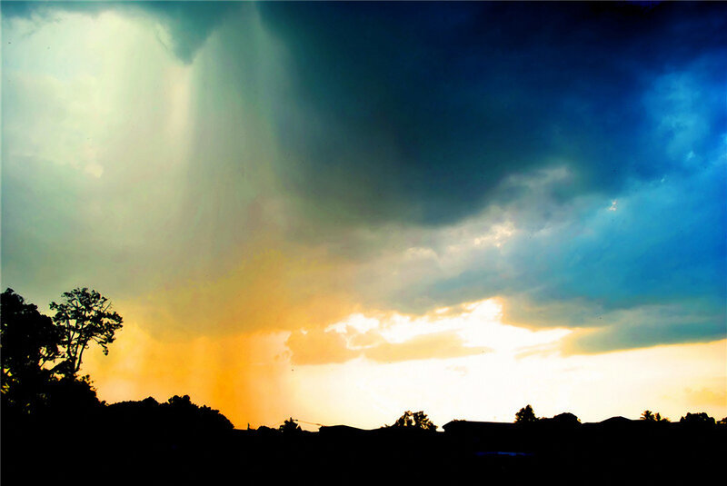 Sunlight breaking through storm clouds