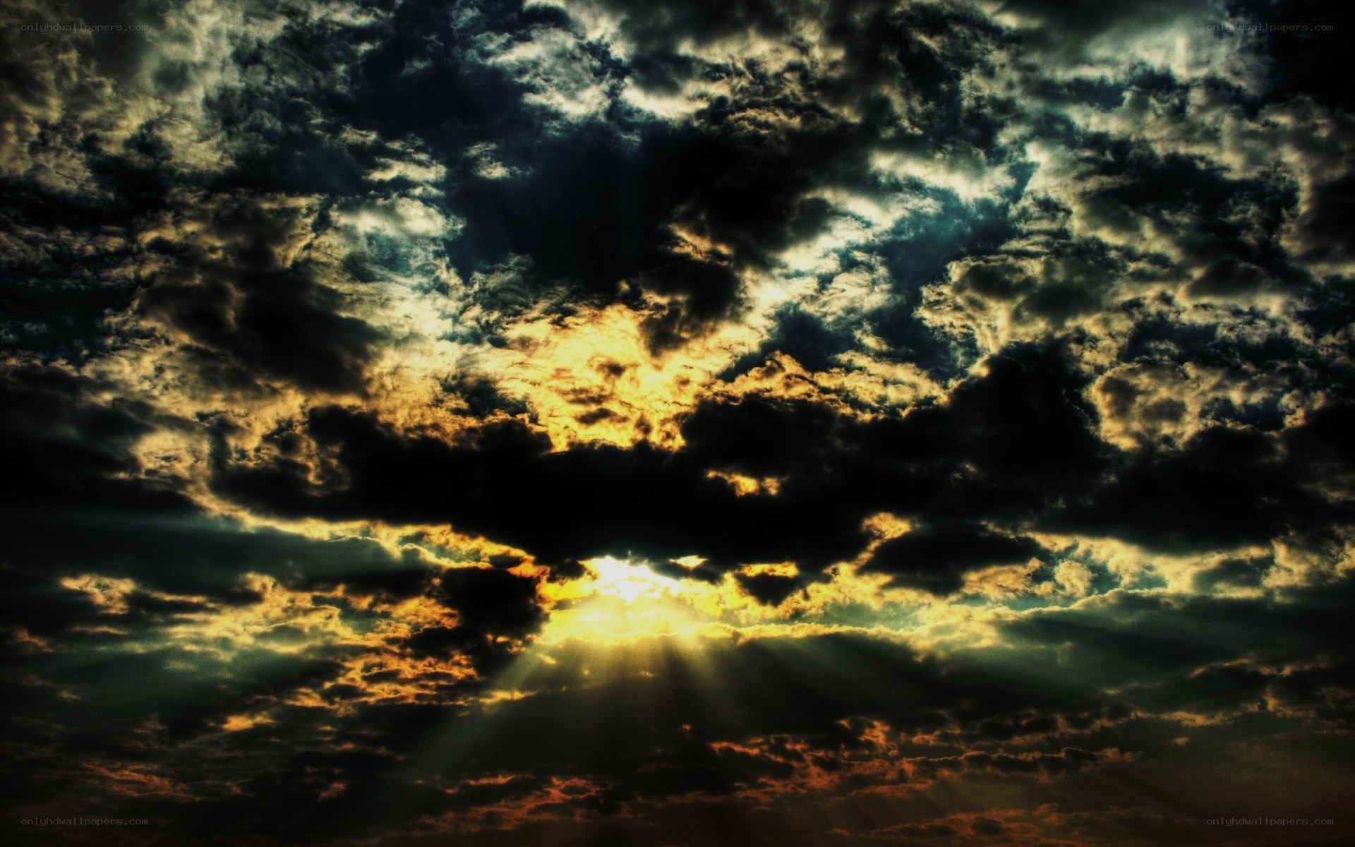 Sunlight breaking through storm clouds