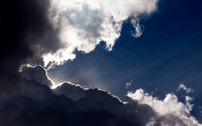 Sunlight breaking through storm clouds