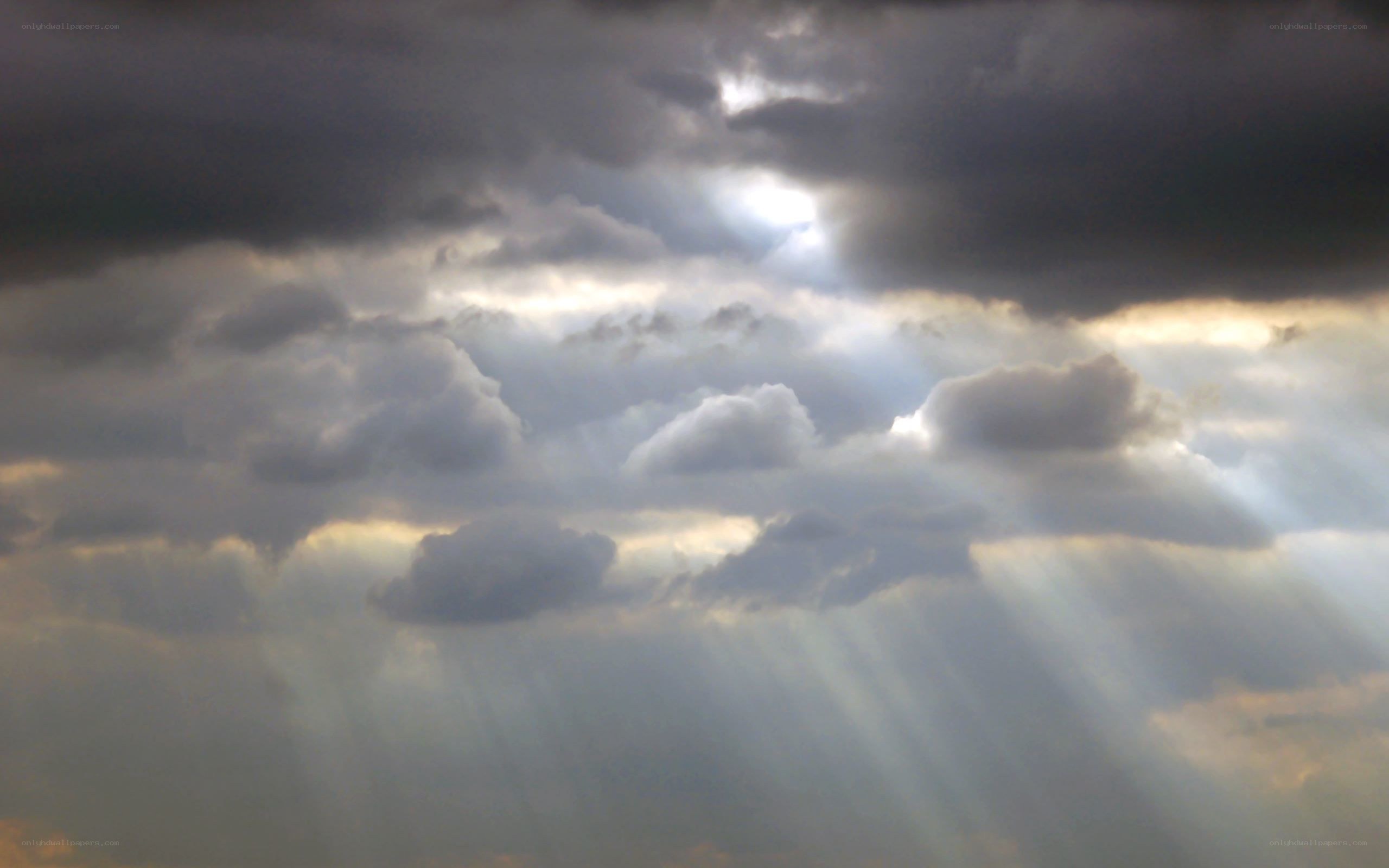 Sunlight breaking through storm clouds