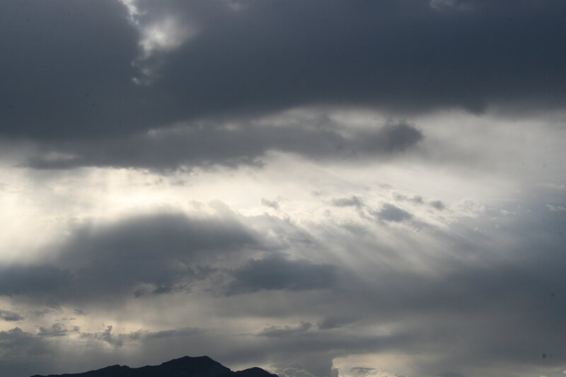 Sunlight breaking through storm clouds