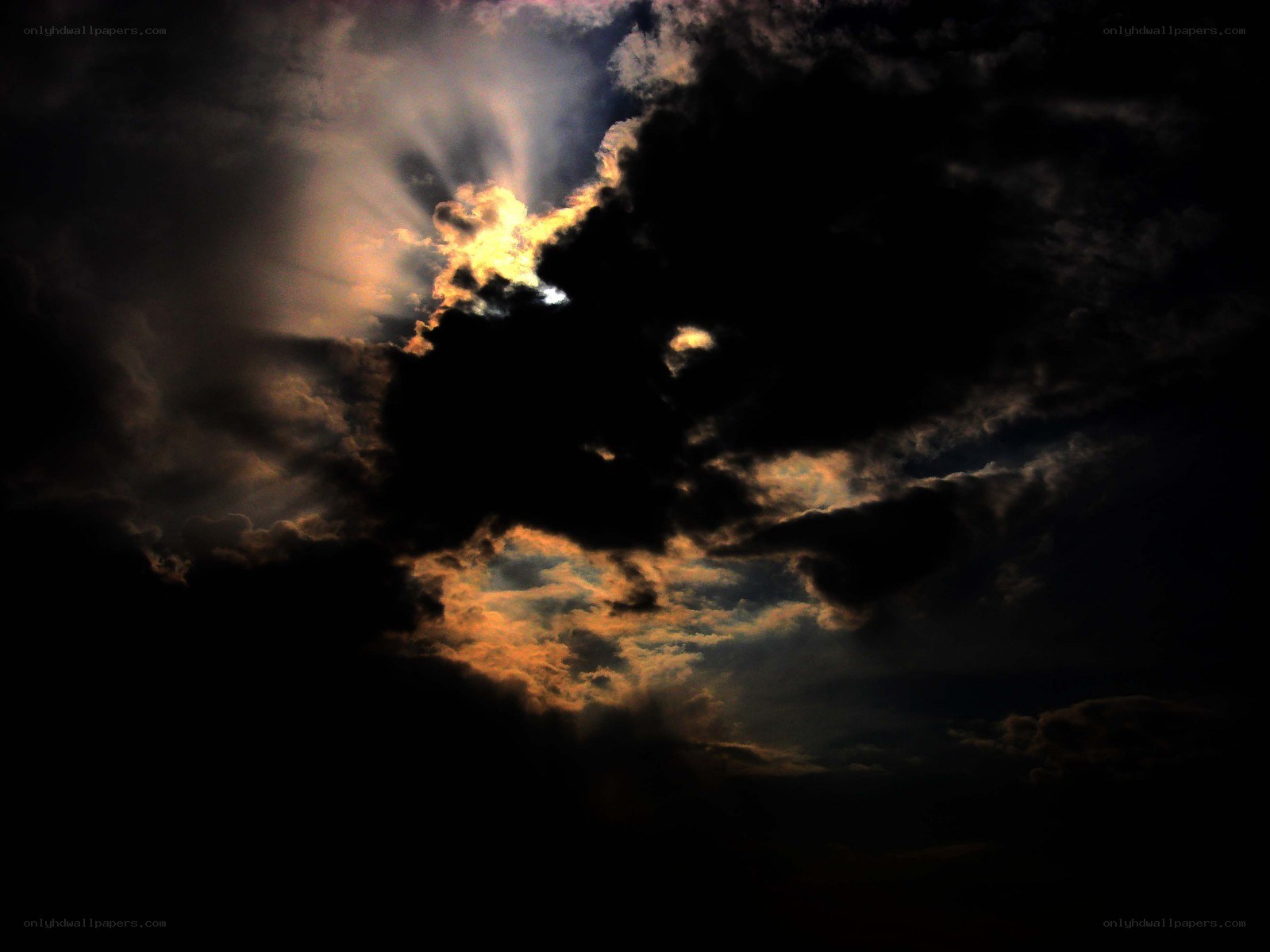 Sunlight breaking through storm clouds