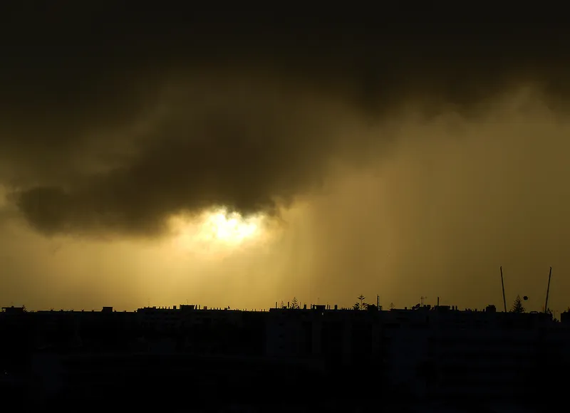 Sunlight breaking through storm clouds