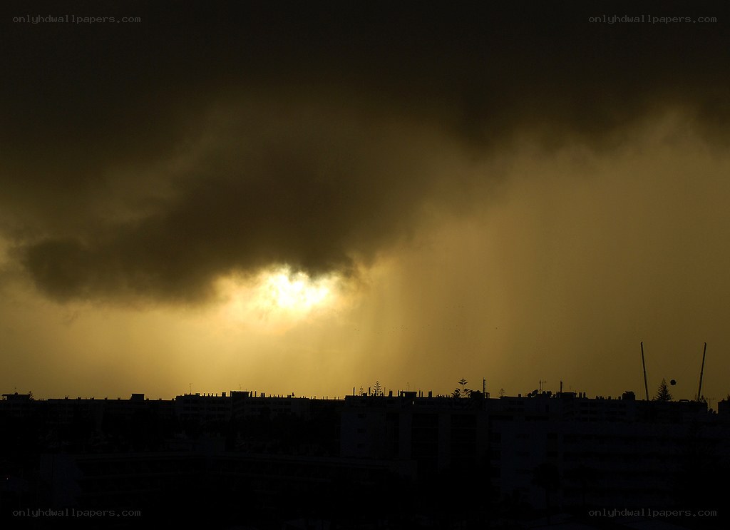 Sunlight breaking through storm clouds