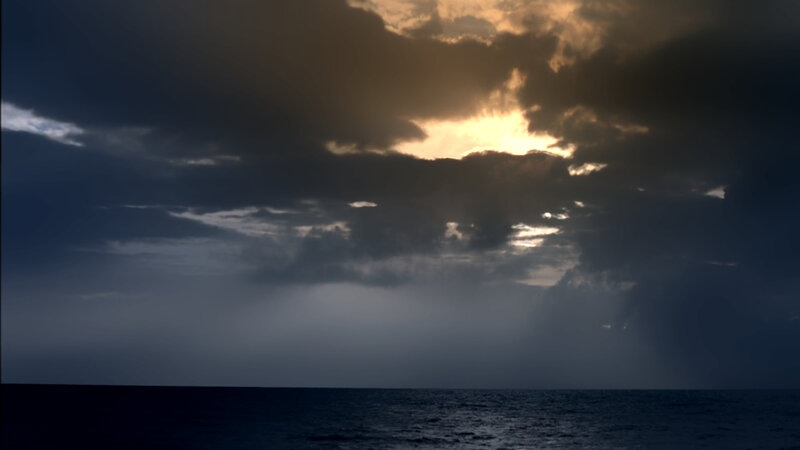 Sunlight breaking through storm clouds