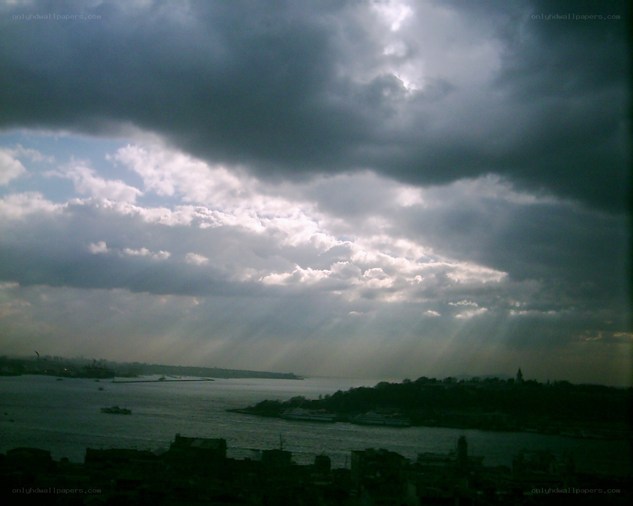 Sunlight breaking through storm clouds