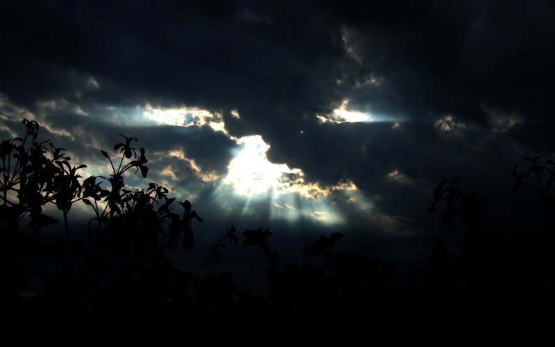 Sunlight breaking through storm clouds