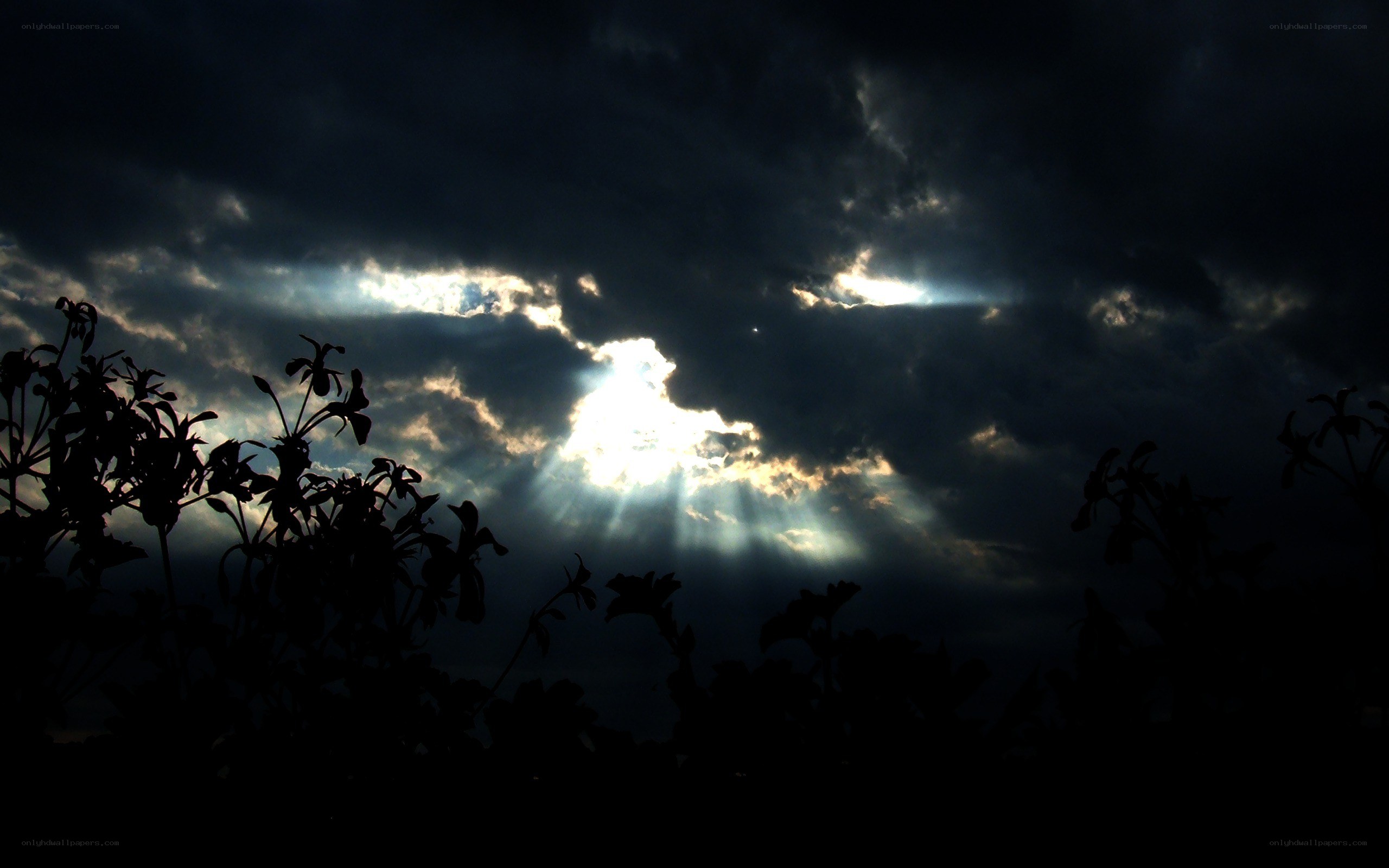 Sunlight breaking through storm clouds