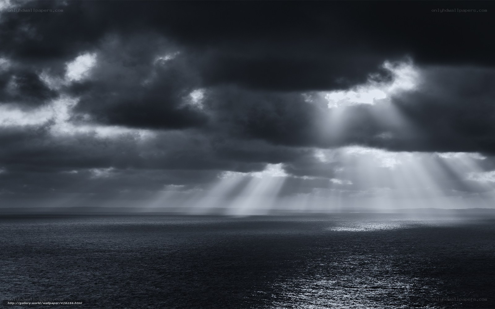 Sunlight breaking through storm clouds