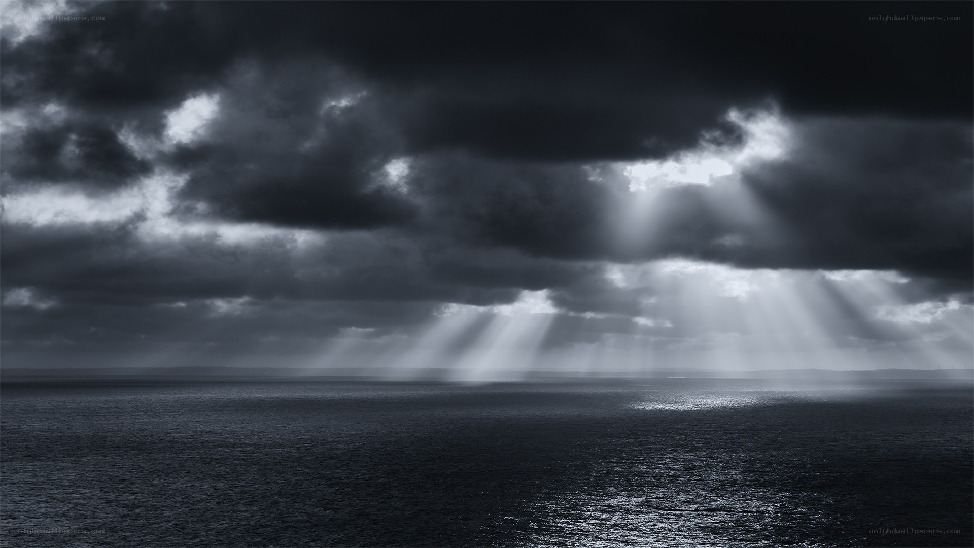 Sunlight breaking through storm clouds