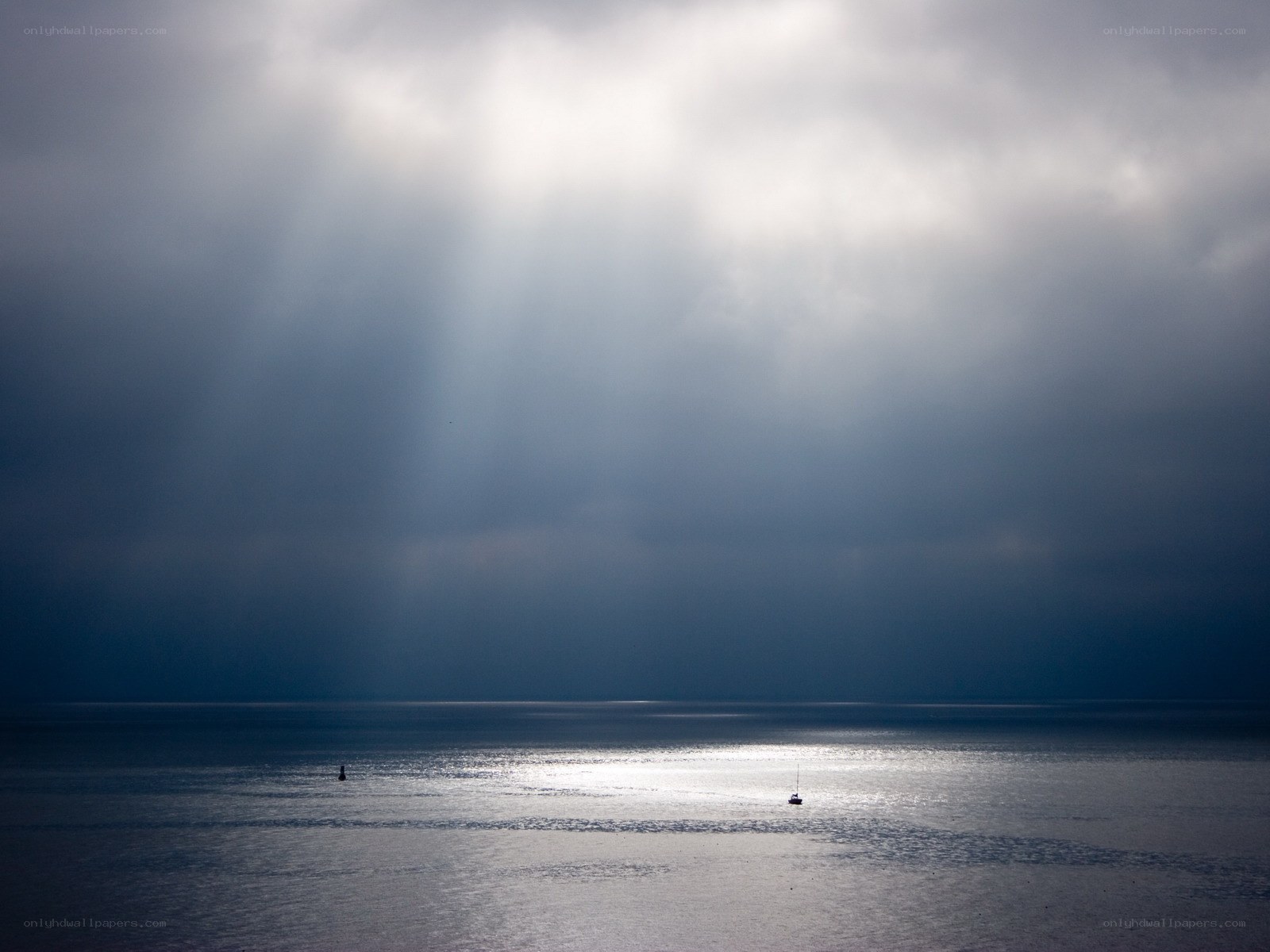 Sunlight breaking through storm clouds