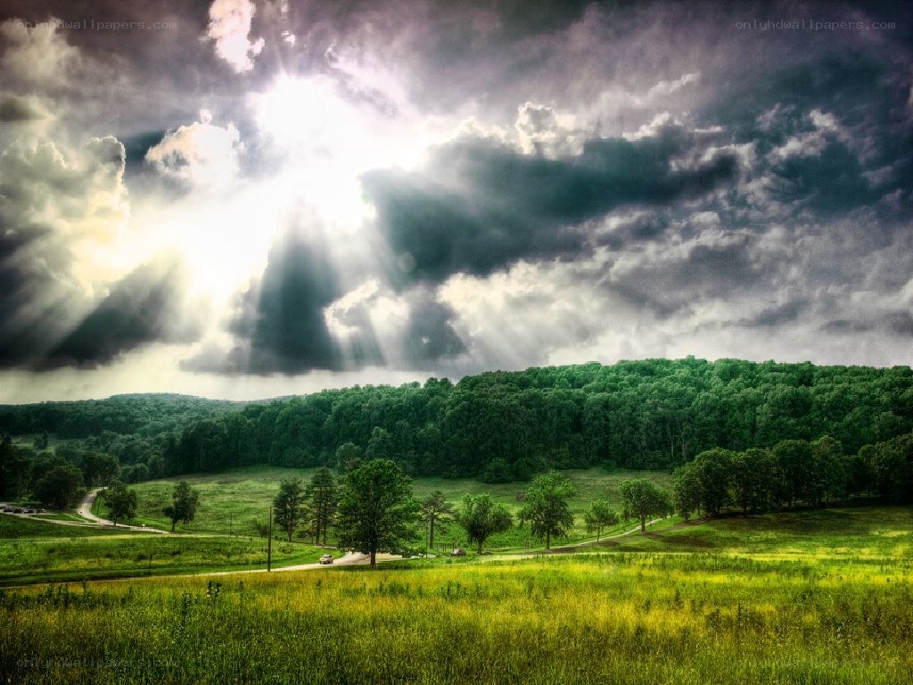 Sunlight breaking through storm clouds