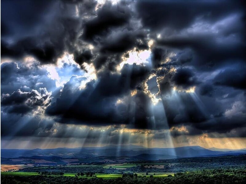 Sunlight breaking through storm clouds
