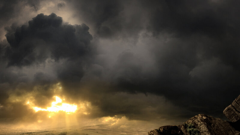 Sunlight Breaking Through Storm Clouds — Gray