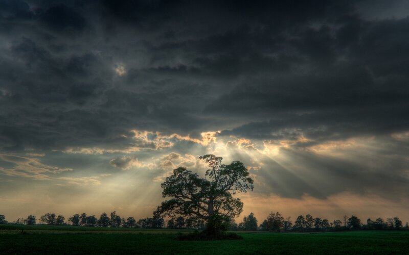 Sunlight breaks through storm clouds