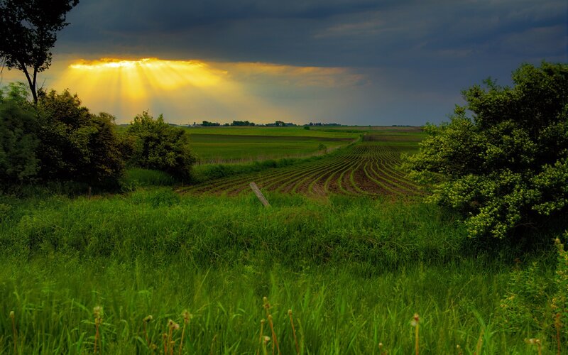 Sunlight breaks through storm clouds