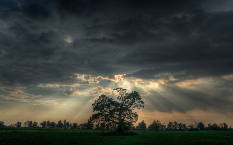 Sunlight breaks through storm clouds
