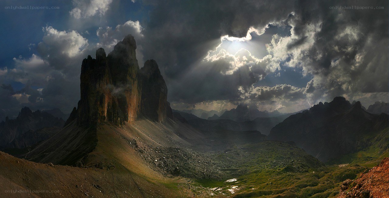 Sunlight breaks through storm clouds