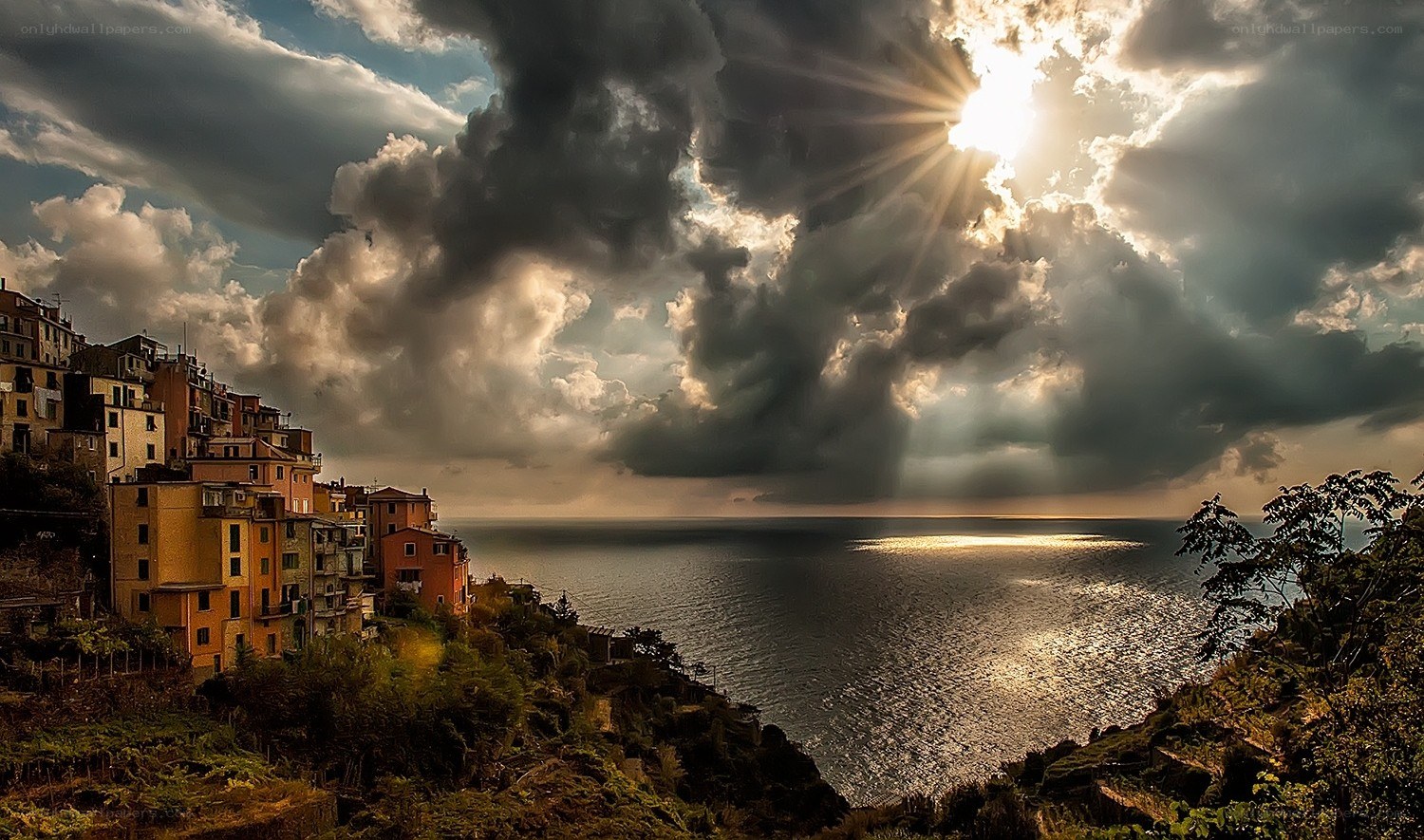 Sunlight breaks through storm clouds