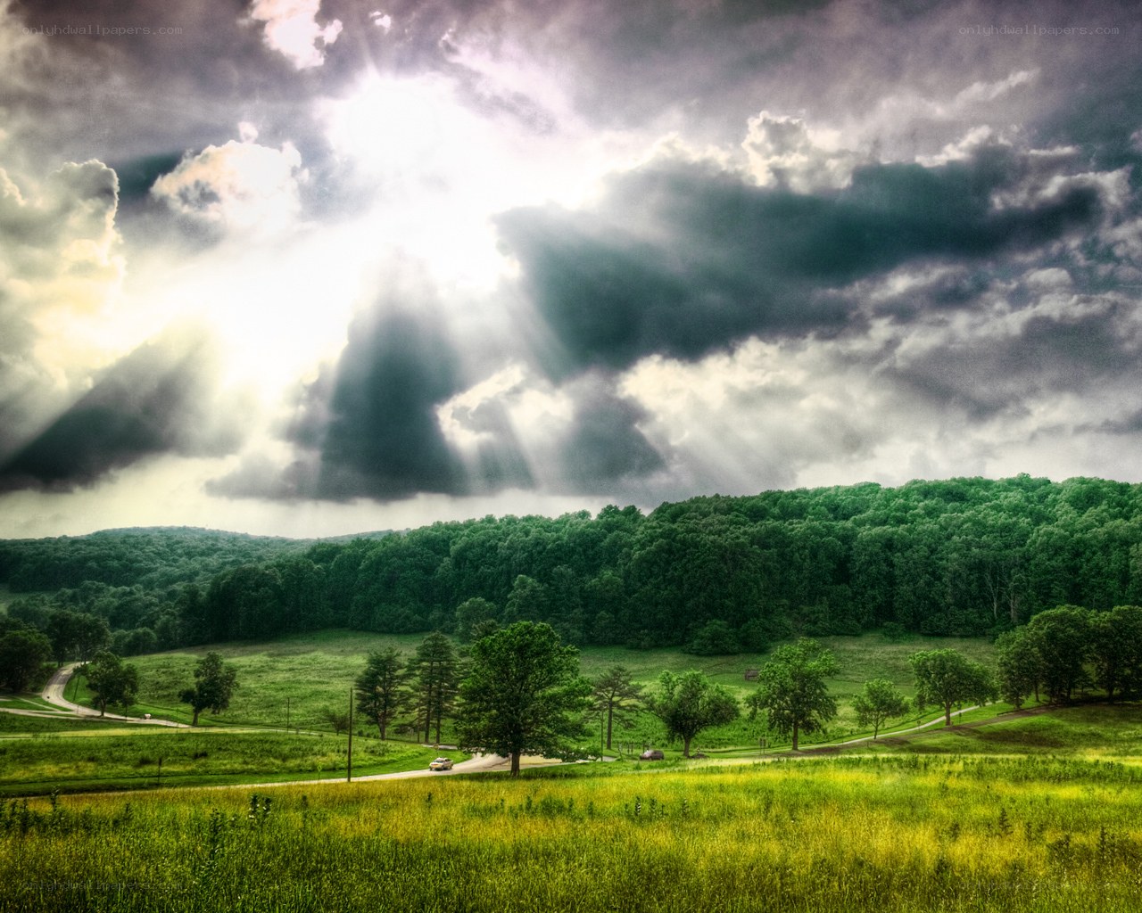 Sunlight breaks through storm clouds