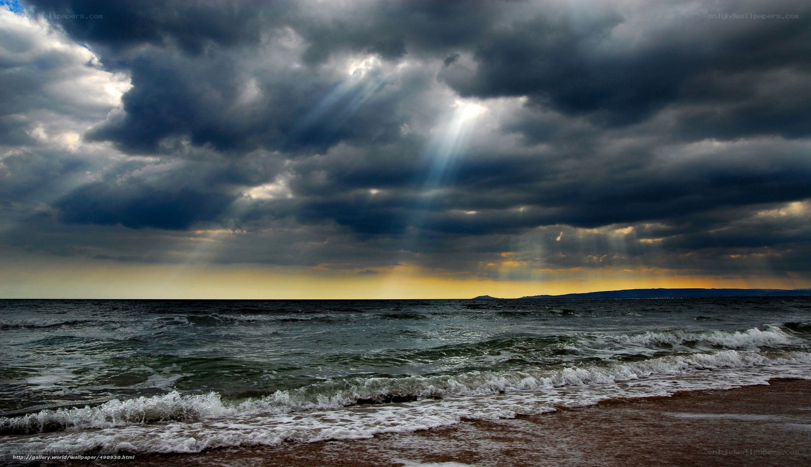 Sunlight breaks through storm clouds