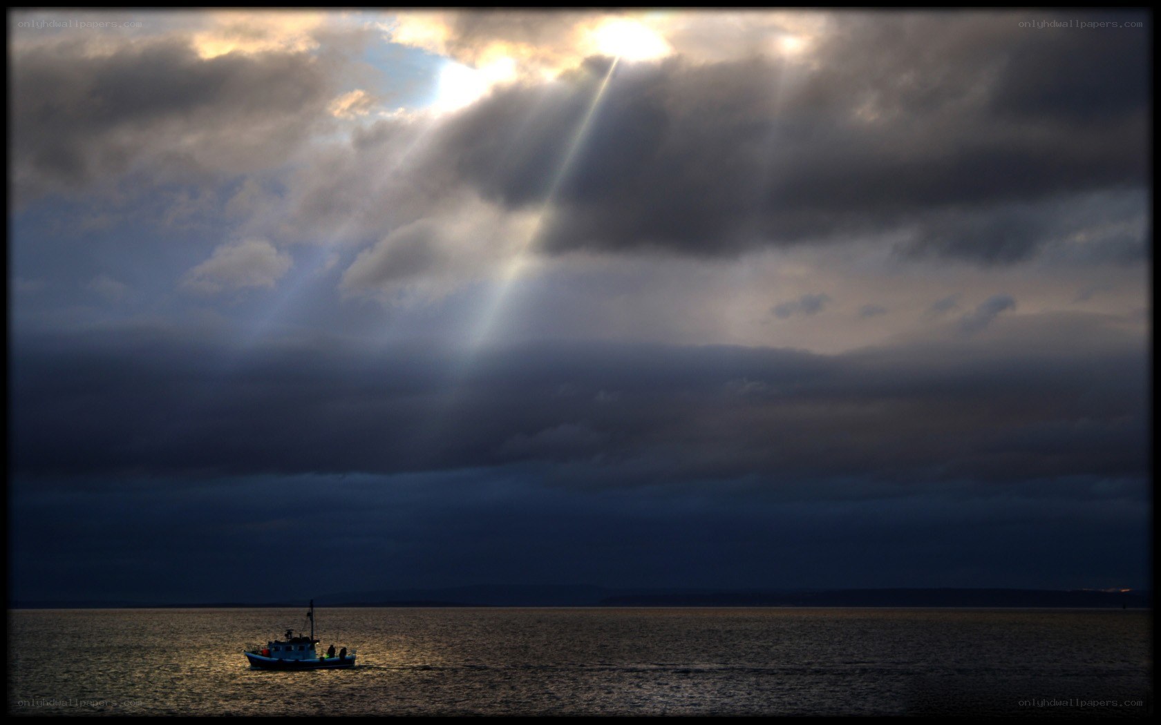 Sunlight breaks through storm clouds