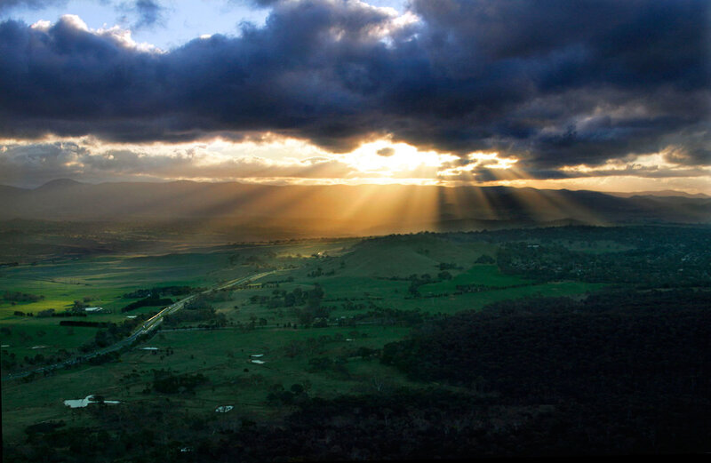 Sunlight breaks through storm clouds