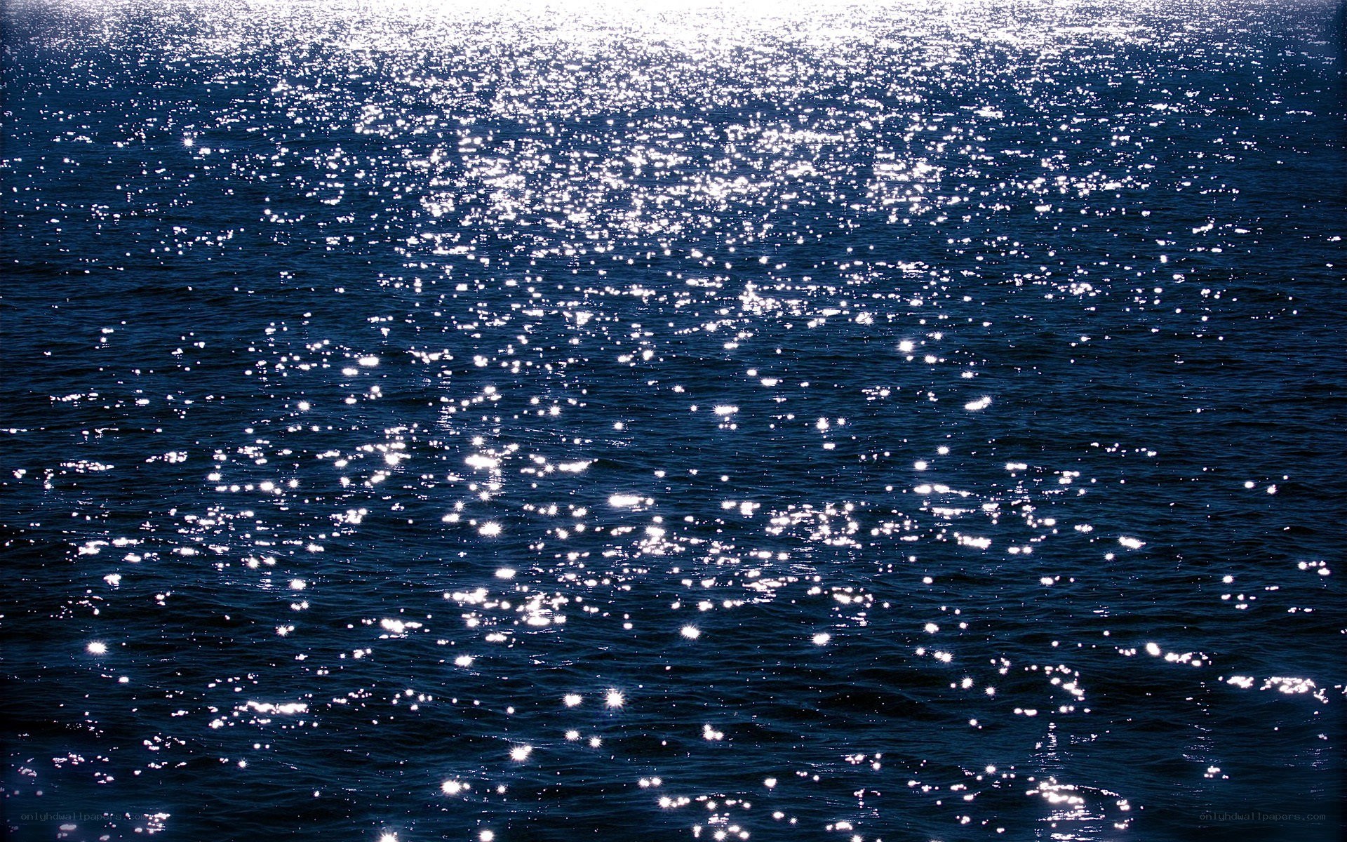 Sunlight glinting on ocean water