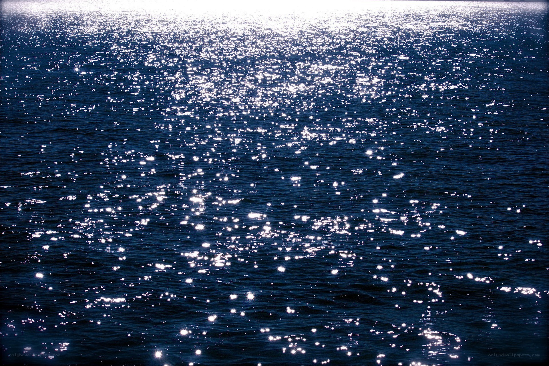 Sunlight glinting on ocean water