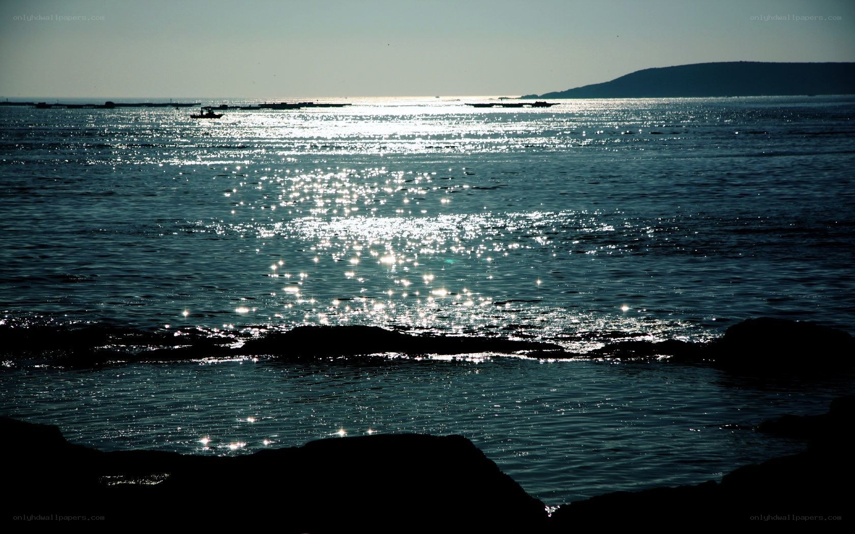 Sunlight glinting on the sea