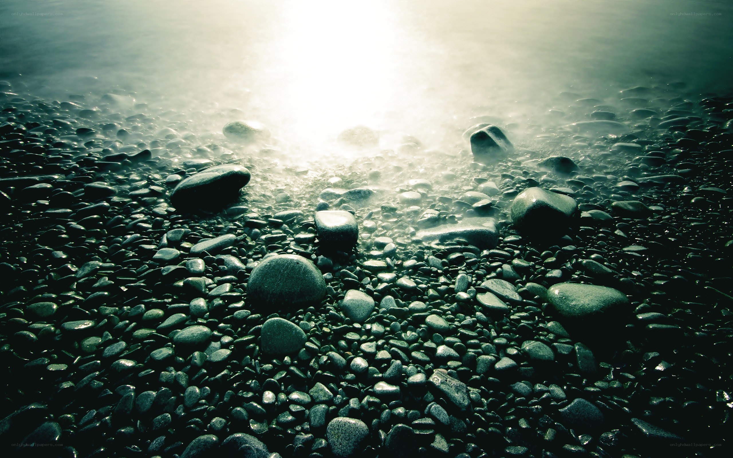 Sunlight on a pebble beach