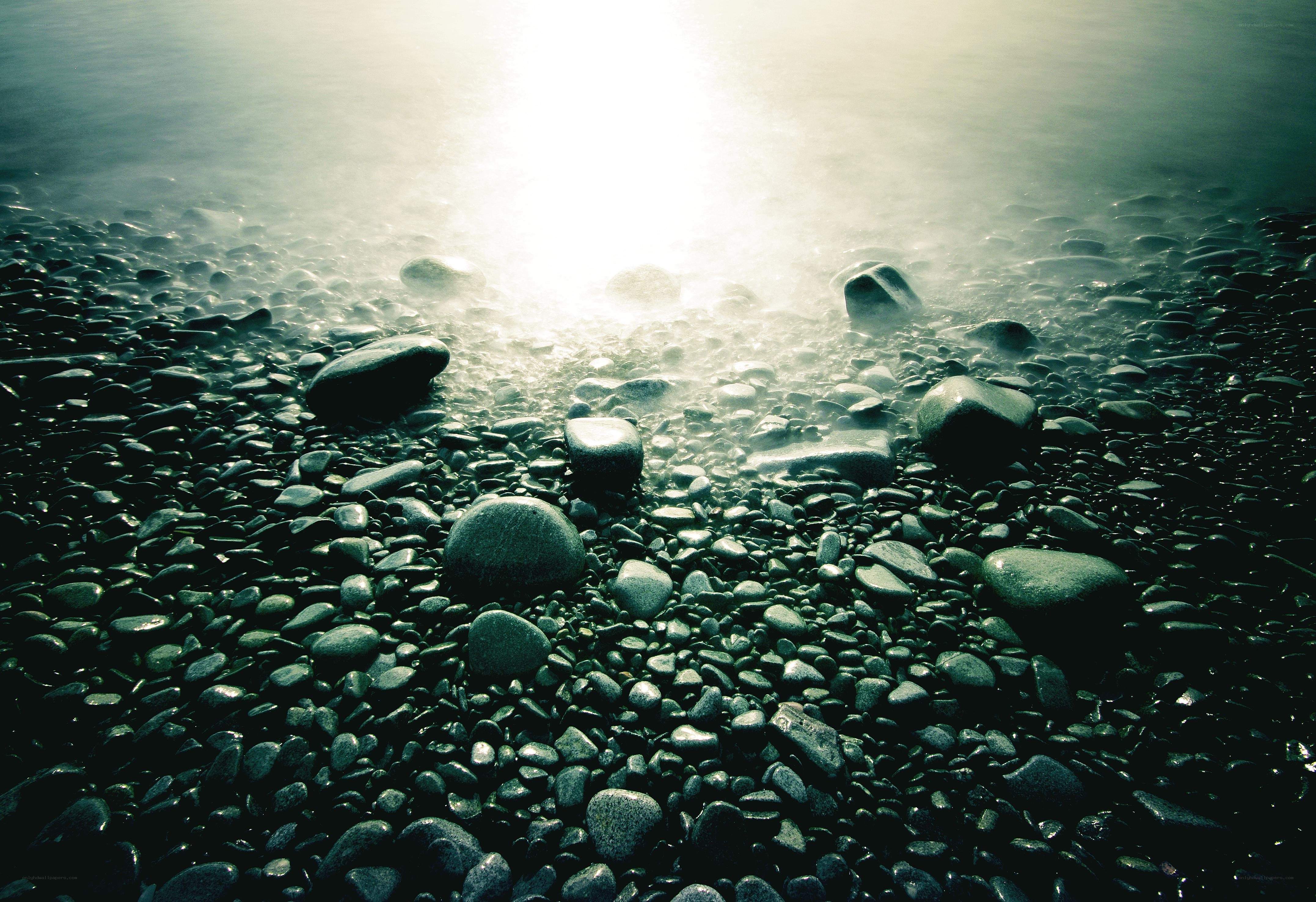 Sunlight on a pebble beach