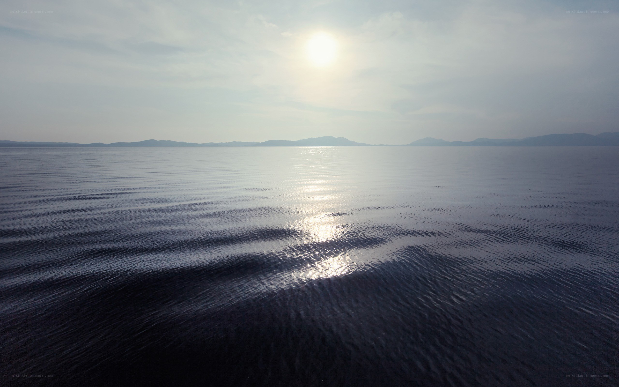 Sunlight on calm ocean waters