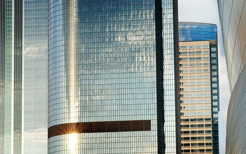 Sunlight on glass skyscraper